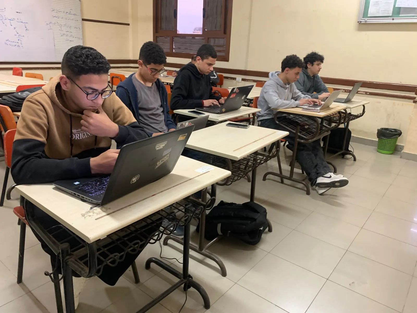 The boys' group working through the boba workshop together